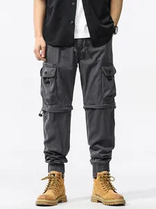Vintage grijze heren cargo broek met meerdere zakken en een losse techwear pasvorm
