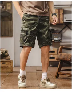 Detail of men's camouflage cargo shorts with functional multi-pockets and loose fit