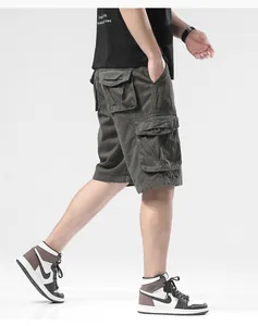 Side profile of men's loose cargo shorts with functional multi-pockets in dark green