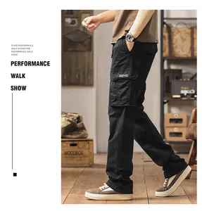Detailed side profile of men's black straight-leg cargo pants with functional utility pockets