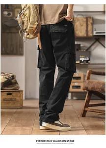 Back view of men's loose straight black cargo pants with multiple side pockets