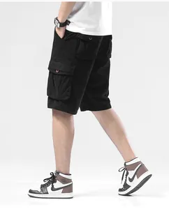 Detailed side view of men's black cargo shorts featuring large utility pockets