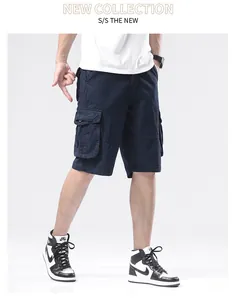 Macro view of men's navy blue multi-pocket cargo shorts in a relaxed casual summer style
