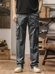 Men's loose straight-leg dark grey cargo pants with multiple functional pockets