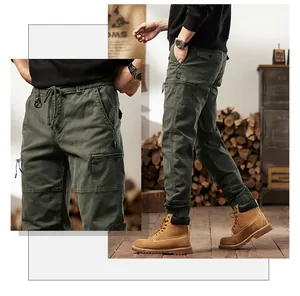 Men's olive cargo jogger pants with multi-pockets and a retro military style