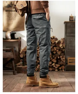 Rear view of men's vintage charcoal cargo joggers with multiple utility pockets