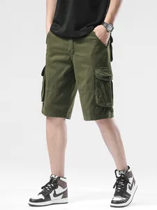 Men's loose olive green cargo shorts with multiple pockets for casual summer wear