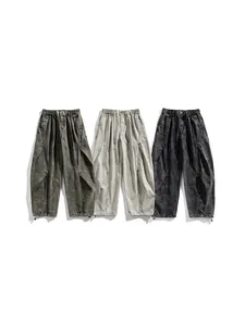 Men's techwear cargo pants with multiple pockets in three colors on white background