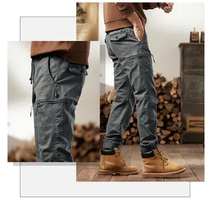 Close-up detail showing multi-pocket design and fabric texture of men's grey cargo pants.