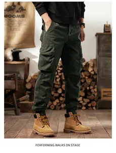 Detailed shot of men's American retro olive green cargo pants with utility pockets
