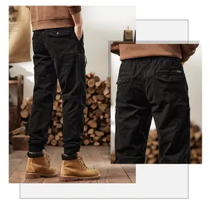 Detailed back view of men's vintage black cargo jogger pants with functional multi-pockets.