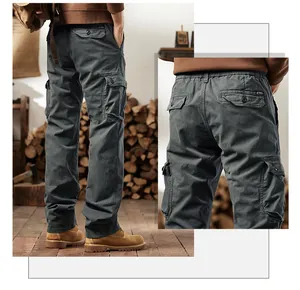 Detail view of men's vintage multi-pocket cargo pants in dark grey heavy cotton fabric.