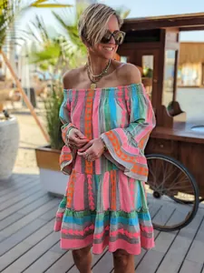 Vibrant bohemian off-the-shoulder dress with colorful geometric patterns and bell sleeves.