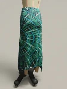 Detailed view of a green and black tie-dye spiral print vacation maxi skirt on mannequin