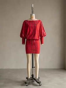 Detail of red tie-dye off-shoulder bodycon dress with batwing sleeves.