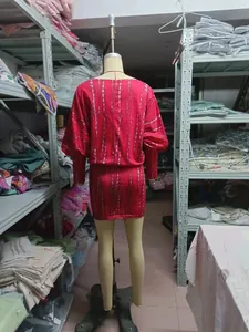 Back view of a red tie-dye batwing sleeve bodycon mini dress displayed on a mannequin.