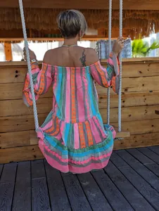 Colorful off-shoulder tiered resort dress with vibrant geometric prints for women