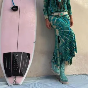 Close-up detail view of bohemian tie-dye slit maxi skirt ideal for beach vacation styling