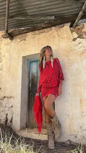 Red tie-dye off-the-shoulder mini dress featuring batwing sleeves in a bohemian style
