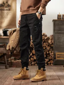 Stylish men's vintage black cargo joggers with multiple pockets and drawstring waist