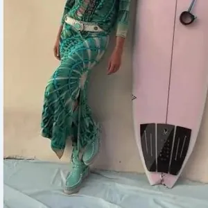 Bohemian teal printed slit skirt with decorative belt and matching shoes for vacation