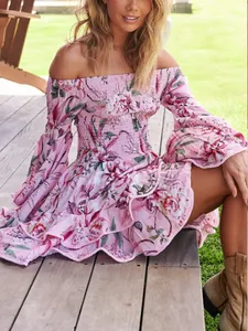 Floral off-the-shoulder mini dress featuring smocked bodice and flared ruffle sleeves
