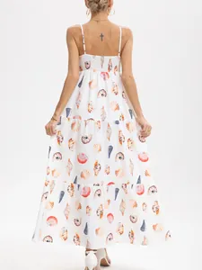 Back view of a white tiered spaghetti strap maxi dress with colorful seashell prints