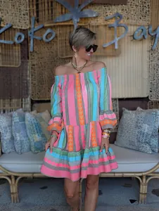 Bohemian off-the-shoulder mini dress with vibrant striped patterns and bell sleeves