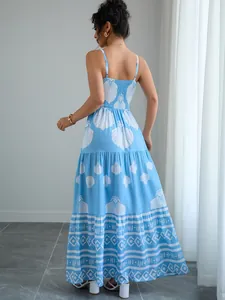 Back view of a stylish bohemian blue shell print maxi sundress with tiered skirt