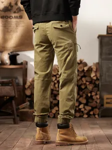 Classic men's olive green American retro cargo joggers with multi-pockets and elastic cuffs