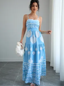 Detail view of the shell pattern and ethnic print on this light blue summer maxi dress