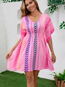 Detailed view of pink bohemian print V-neck dress for vacation beach cover-up