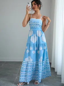 Elegant summer blue and white ethnic print tiered maxi sundress with nautical shell patterns