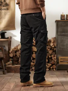 Men's vintage American cargo pants with multiple pockets in a retro outdoor style.