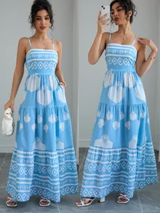 Light blue summer maxi dress with ethnic seashell print and tiered skirt details