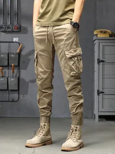 Herren Cargo-Hose in Khaki mit mehreren Taschen und Fleecefutter für Outdoor-Aktivitäten.
