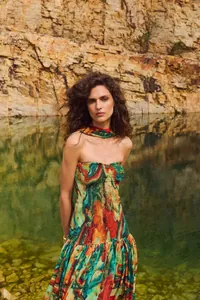 Vibrant abstract print strapless smocked maxi dress with matching neck scarf detail.