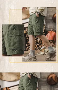 Detailed view of men's olive green cotton cargo shorts with side pockets and buttons