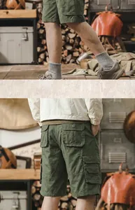 Detailed back and side views of men's olive green cotton cargo shorts with multiple pockets.