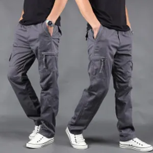 Detail view of men's grey multi-pocket cargo pants showing straight-leg fit and side pockets.