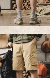 Detailed view of premium khaki cotton cargo shorts with functional pockets for men's casual wear