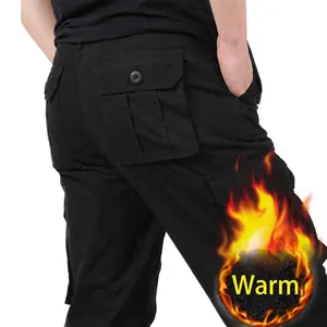 Detailed view of the back pockets and thermal lining on men's black cotton cargo pants