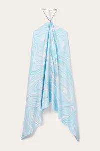 Macro view of blue and white swirl print satin halter dress with an irregular hemline