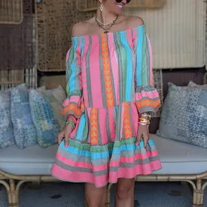 Bohemian off-the-shoulder mini dress with colorful geometric patterns and flare sleeves