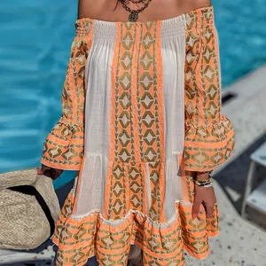 Bohemian off-shoulder vacation dress with orange geometric patterns and bell sleeves