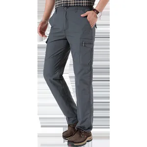 Pantaloni da trekking grigi da uomo, asciugatura rapida, impermeabili e multitasche.