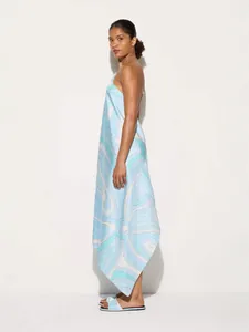 Elegant satin halter dress with light blue abstract swirls and an asymmetrical hem