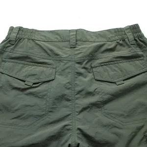 Back view of army green quick-dry outdoor cargo pants with elastic waist and flap pockets.