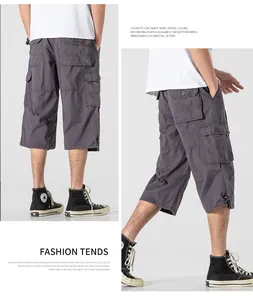 Detailed view of men's loose gray cargo shorts with multiple pockets for casual summer wear
