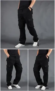 Detailed view of men's black cargo pants with six pockets and relaxed straight leg fit